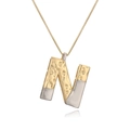 Two-tone gold and silver necklace with hammer-textured capital letter N pendant - Letter N