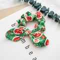 Green plush Christmas scrunchie with rabbit ear knot and festive snowflake pattern - Green Large Snowflake