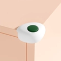 L-shaped white silicone edge protector with green detail for baby safety and desk corners - Shell Dual Color-White