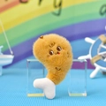 Close-up detail of a cute fuzzy fried chicken leg plush pendant with embroidered face - Chicken Leg Bread / 8x12cm