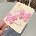 Set of two pink sequin butterfly hair clips with pearls on a fashion display card - Pink BB Clip (Pair)
