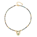 Collana di perline bohémien con pietre turchesi e ciondolo a sole dorato su sfondo bianco - Ciondolo Sole Vintage Francese (XL-392J) / Oro