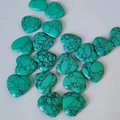 Polished turquoise heart-shaped stone ornaments with unique black webbed veins - Turquoise (Synthetic)