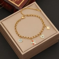 Dettaglio del bracciale smaltato dorato con ciondoli colorati su una scatola porta gioielli - Stile Girasole Pesce Piccolo (6#)