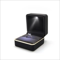 Black LED ring box with gold trim featuring an internal light and velvet lining - Rounded Corner Gold-rimmed Light Box - Black (clearance); Ring Box (can Hold Earrings)