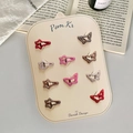 Cute star and butterfly hair clips set for girls in red, pink, and brown colors - Butterfly Meteor Style