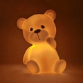 Luz nocturna de osito de peluche en silicona naranja brillante para niños - Oso Amarillo de Cabeza Inclinada