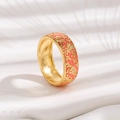 Golden enamel flower ring with pink coral background and sparkling zircon leaf details - US 6 / Pink