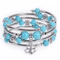 Detail of bohemian wrap bracelet featuring turquoise beads and clover lucky charm - Light Blue Turquoise Texture (Style-4)