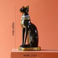 Groot vintage zwart hars Egyptisch Bastet kattenbeeld met gouden accenten en sieraden - Zwart Goud Egyptische Kat - Groot