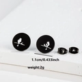 Minimalist black stainless steel bird on branch stud earrings with 1.1cm diameter - 094 Bird in Circle / Black