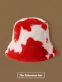 Winter plush fisherman hat with red and white cow print pattern in a soft furry texture - Cow Print Bucket Hat - Red