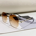 Lunettes de soleil polygonales avec monture en métal doré et verres dégradés marron - Monture Dorée Verres Ambrés Dégradés