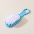 Blue baby hair brush with soft white bristles and ergonomic handle for infant grooming - Blue Brush