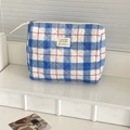 Quilted blue and white checkered makeup bag with red stitch accents and zip closure - Clutch Bag