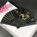 Classic black folding fan with gold plum blossom print and elegant Chinese calligraphy - Black & Gold Plum Blossom Poetry Style (Women's Fan-91)