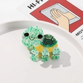 Cute green sea turtle hair claw clip made of acetate with cartoon details and shell spots - Green & Yellow