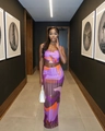 Close-up of pleated geometric print crop top and high-waist maxi skirt set - Lavender Print