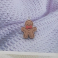 Gingerbread man resin charm in brown with red bow and silver ring for DIY keychain jewelry - Gingerbread Man with Red Bow
