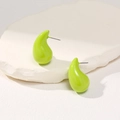 Chic neon green teardrop studs on a white textured stone for a minimalist aesthetic - Apple Green