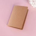 Folded brown kraft paper envelope with heart detail on a soft pink background - Kraft Folded Card / Large