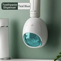 Wall-mounted automatic toothpaste dispenser in teal blue finish with clear window - Azure Blue