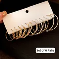 6 Pairs set of gold hoop earrings with twisted and crystal styles on a white card - 44# Silver Pin (12-Piece Set) / Gold