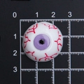 Vue macro d'un œil en résine violette de 2cm avec veines rouges pour bricolage Halloween - Diamètre 2.5cm / L Violet