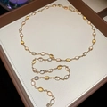 Chic gold-plated resin necklace with colorful oval gems elegantly styled on a tray - Necklace Gold Colorful