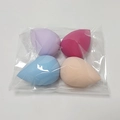 Four-pack of soft water-drop makeup sponges in assorted colors inside transparent bag - 4 Pcs Pack / Four Colors Combination
