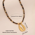 Collier en cordon léopard avec pendentif coquille dorée et détails en acier - Acier Inoxydable/Polyester / Coquillage