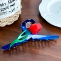 Large acetate hair claw clip featuring a dark blue base with a red tulip flower design - Dark Blue
