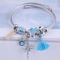 Ethnic Evil Eye Charm Bracelet with blue tassels and stainless steel crystal beads - Sky Blue