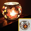 Star pattern mosaic glass candle holder with colorful tiles and warm glowing light - Gold Snowflake