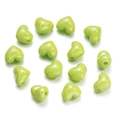 Close-up of glossy green heart-shaped resin beads arranged in a circular DIY pattern - 13X15mm / Green