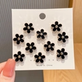 Set of 10 black floral brooches with gold trim on display card for shirt waist adjustment - Style 1 - Five-Petal Flower (10 Pcs)