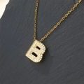 Gold-plated necklace with sparkling zircon Letter B pendant on dark rock background - Letter B (Pendant Only)
