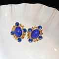 Macro view of vintage blue resin leaf earrings with gold trim on ceramic plate - 58# Silver Needle - Gold - Blue