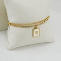 Double-layered golden paperclip chain bracelet with a square 'W' initial pendant - Letter W Style (W)