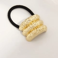 Minimalist gold hammer-textured metal hair tie with black elastic band for ponytails - Lava Rock Triple Row Gold