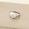 Macro shot of silver heart signet ring with starburst cz stone on leather background - Size 6 / 13mm Heart Inlaid Zircon (KR111015-K) / Silver
