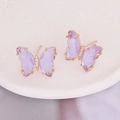 Macro shot of purple butterfly earrings with rose gold frame and micro-set cubic zirconia - Light Purple