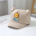 Close-up of beige baby baseball cap featuring 3D ears and cartoon lion patch - 48cm (6 Months-2 Years) / Khaki