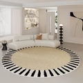 Minimalist round beige rug with black and white striped border in a modern living room - 60x60cm / Romantic Era A