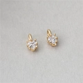Detailed close-up of golden heart pendants with sparkling white zircon inlays - Claw Set Heart Zirconia Pendant (H-2287)