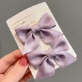 Set of two light purple bow hair clips for girls with satin fabric texture on white card - Purple Pair