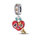 Close-up of silver skull pendant with red enamel heart, gold key and colorful gemstones - Trick or Treat Heart Skull Lock