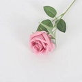 Single pink velvet artificial rose with green leaves on minimalist background - Silk Dusty Pink