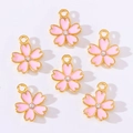 Detail of pink cherry blossom alloy charms with gold plating and clear rhinestone center - Pink