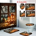 Detail view of 4-piece Halloween bathroom set with pumpkin and skull print on shower curtain - Halloween Window Scene (24-5)